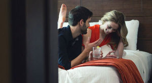 A couple relaxing in their room