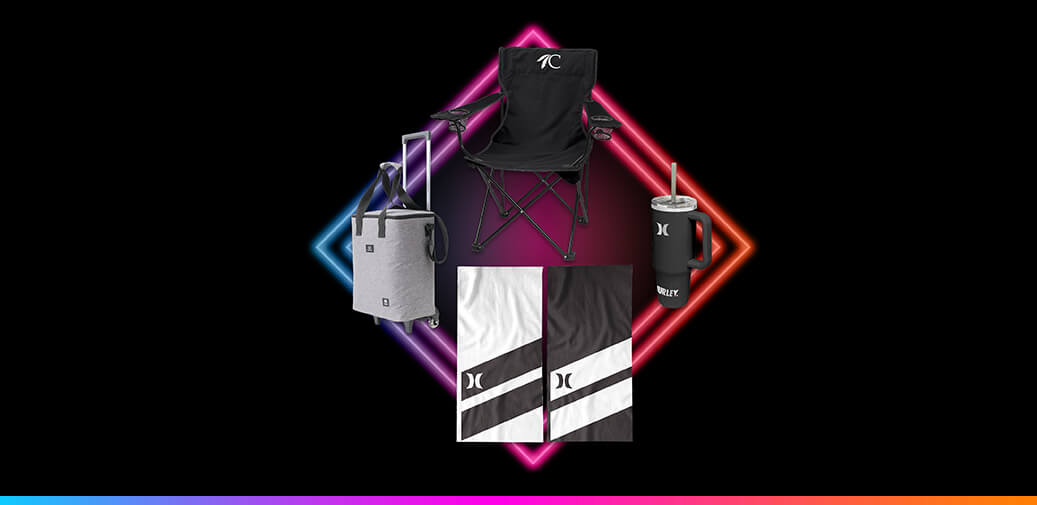 a black folding chair, a grey rolling ice cooler, two black and white towels, and a black tumbler