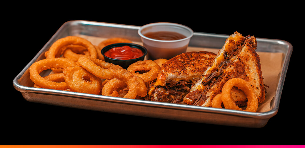 Image of pot roast grilled cheese with onion rings
