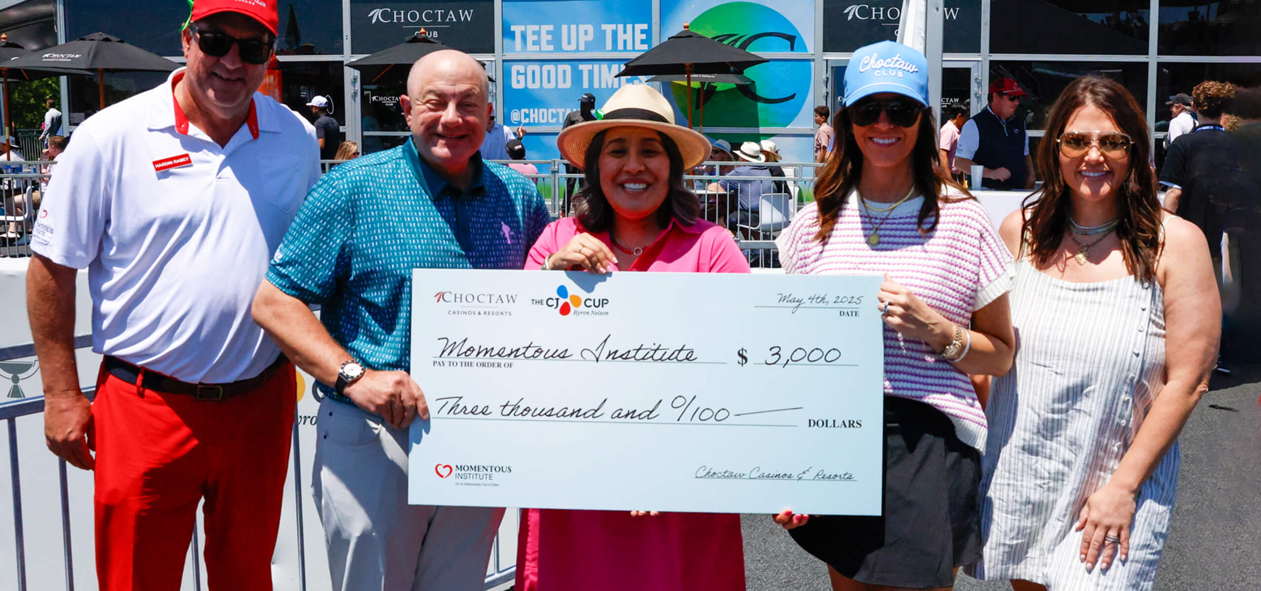 People holding a check