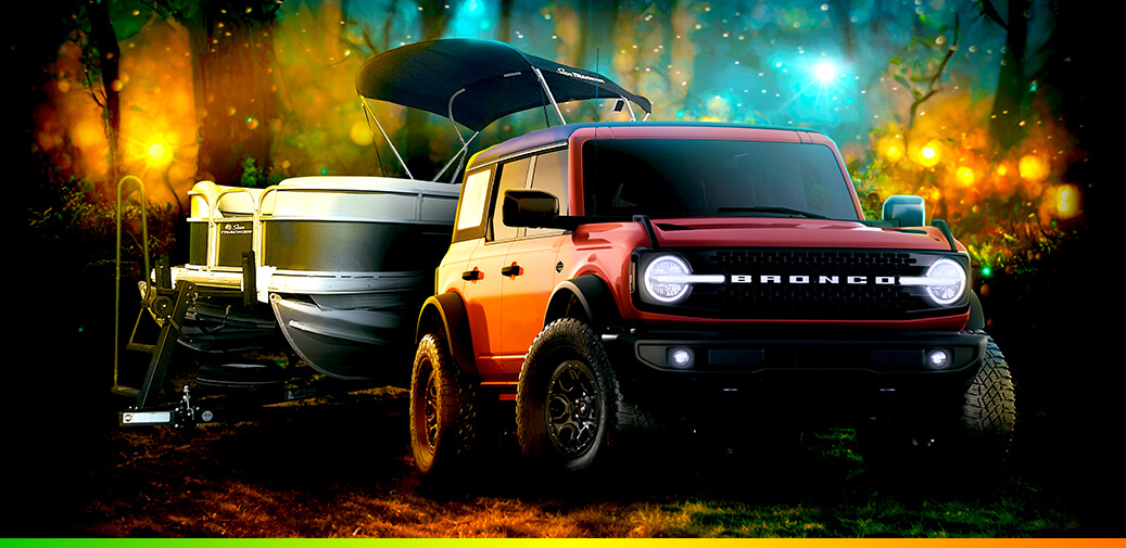 Ford Bronco & Pontoon Boat in the woods