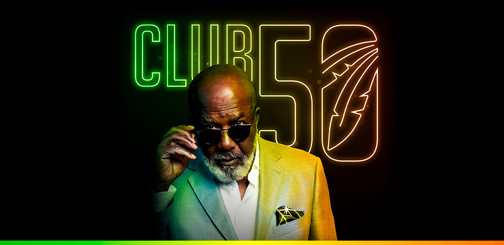Man wearing sunglasses with club 50 logo