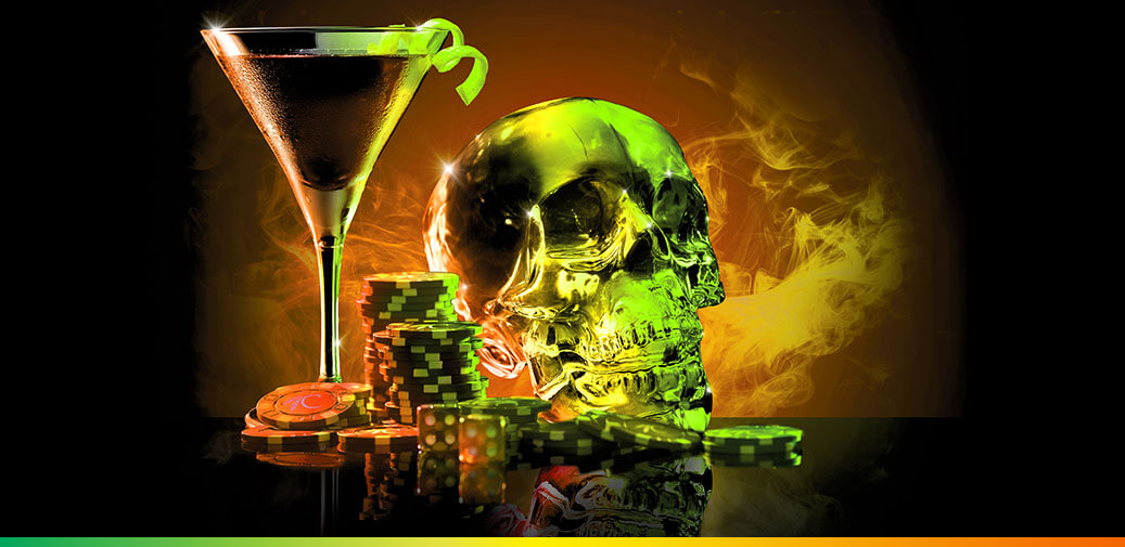 A martini with table game chips and a silver skeleton