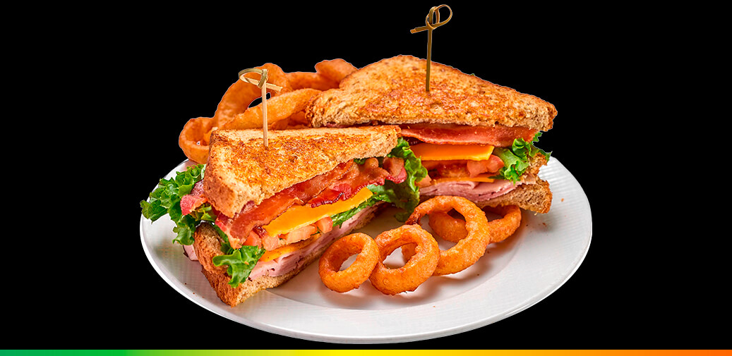 Club sandwich with a side of onion rings