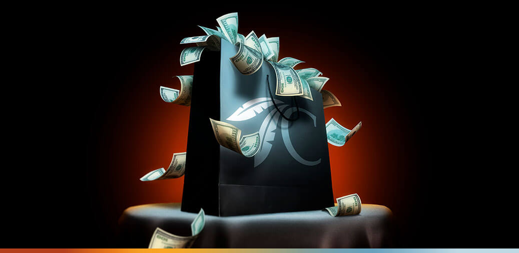 Black Choctaw bag with cash coming out of it