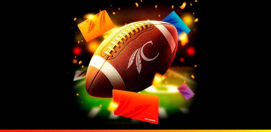 Picture of a football with the Choctaw C and Reward Cards in the air