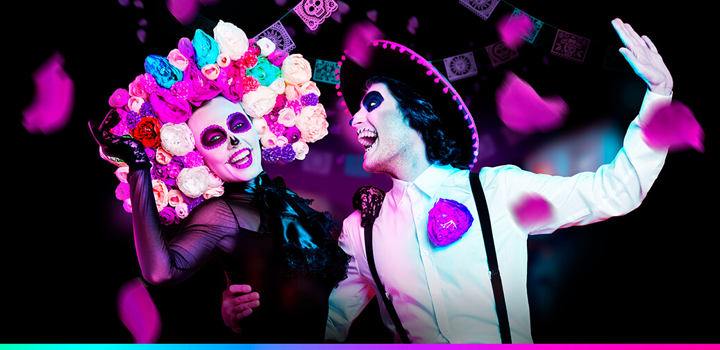 Male and female dressed as sugar skulls