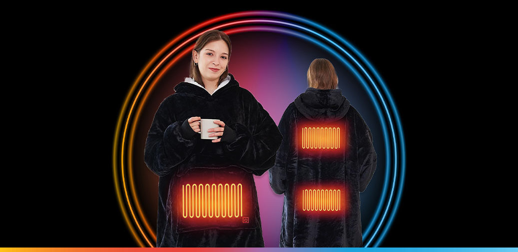 Two people wearing a heated blanket hoodie