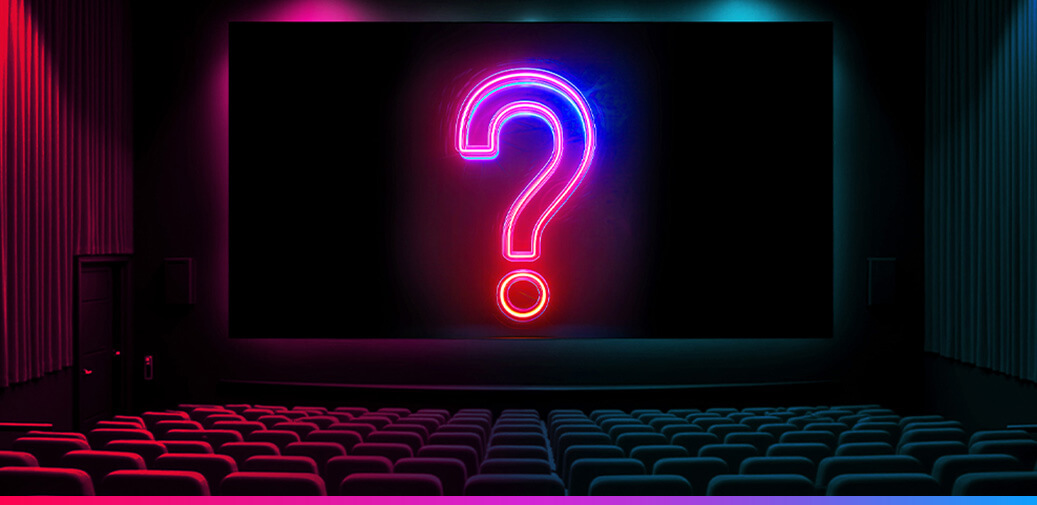 A question mark on a theater screen