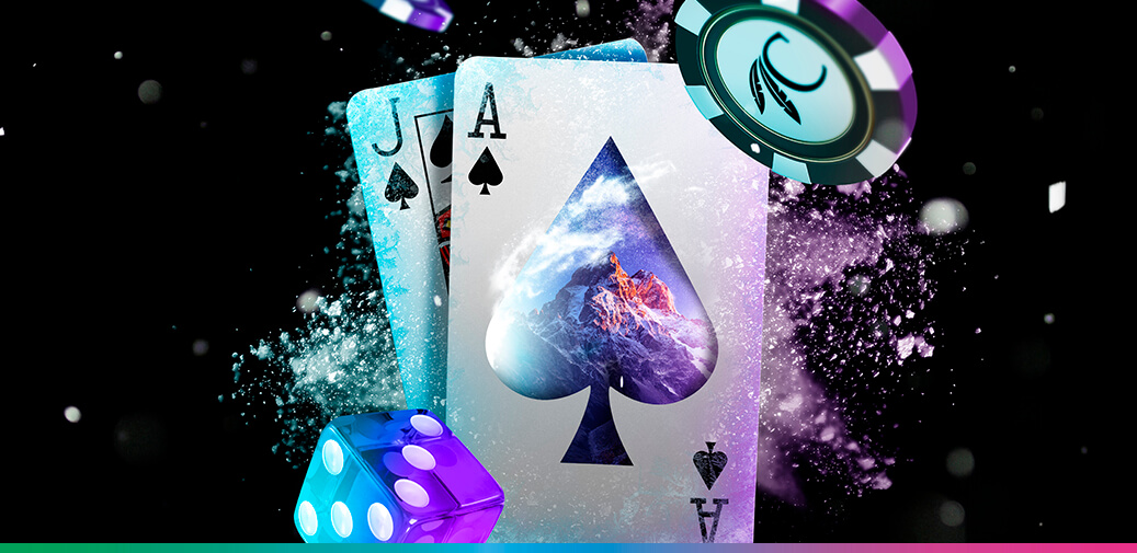 Playing cards covered in snow and table game chips and dice