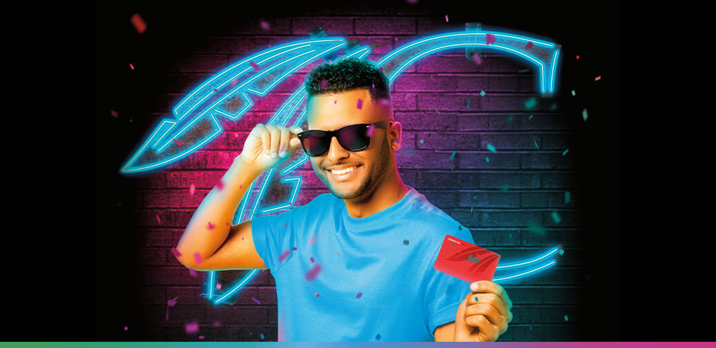 Portrait of a guy holding a Rewards Club Card.