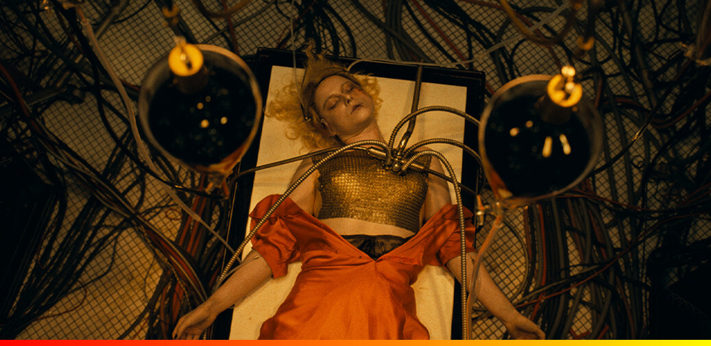 Woman laying on a table with metal wires connected to her