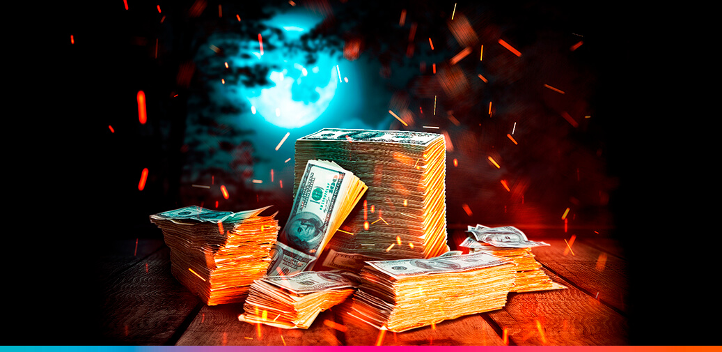 Money stacked in the woods with the moon behind it