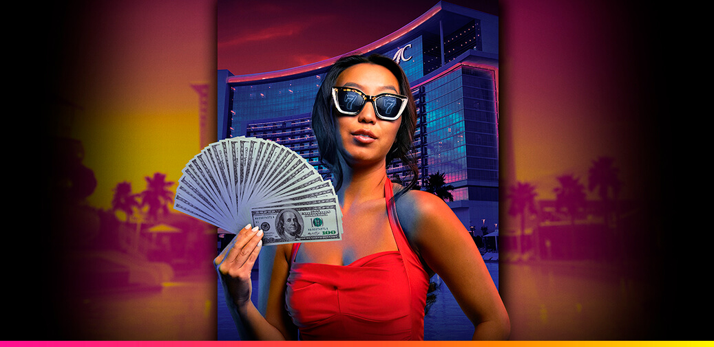 Woman holding hundred dollar bills