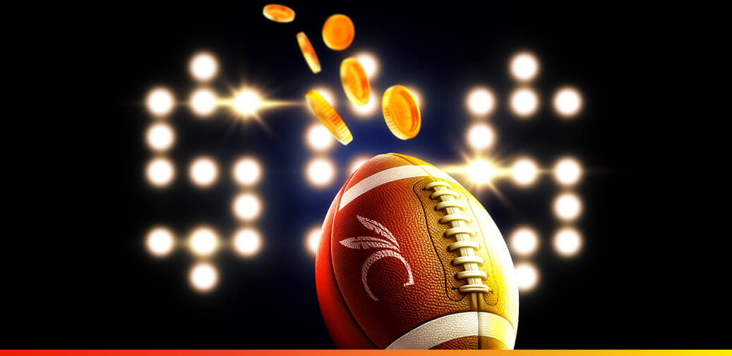 Football with a choctaw logo with stadium lights behind it