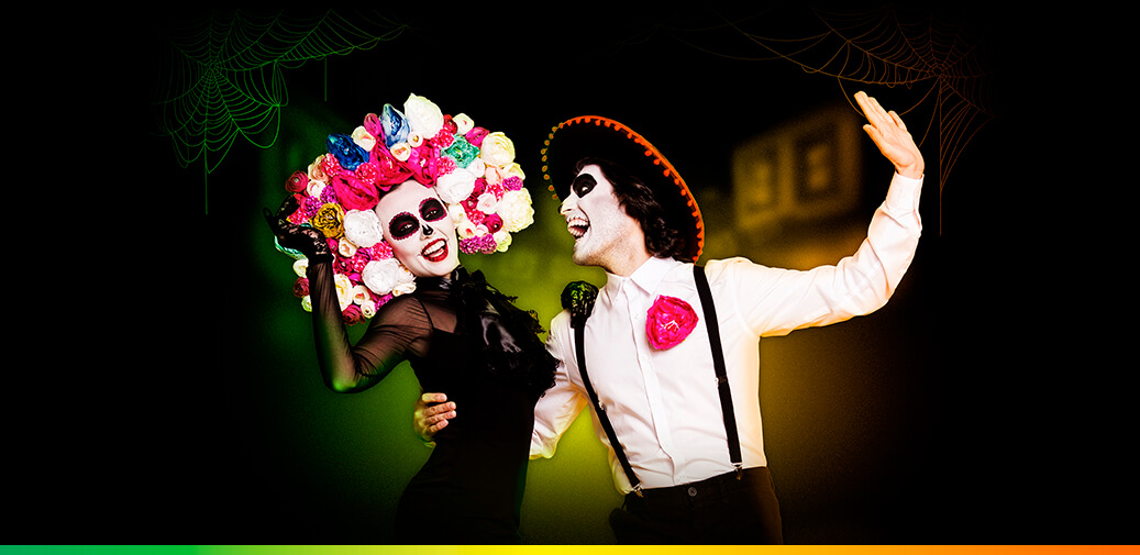 People dressed as sugar skulls
