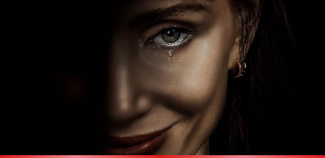 Woman smiling while crying